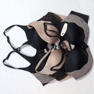 Three Victoria's Secret racer-back Black and Tan Lace Bra Set